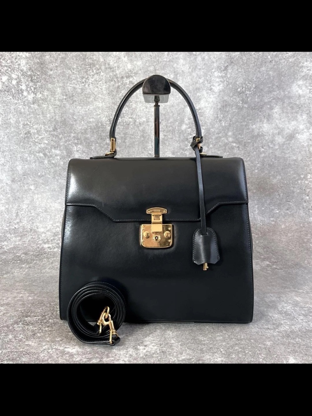 Gucci Black Leather Top-Handle Satchel with Gold Hardware Accent